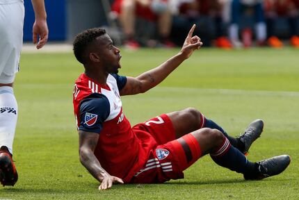 FC Dallas midfielder Kellyn Acosta (23) shouts to a referee after her thought he was tripped...