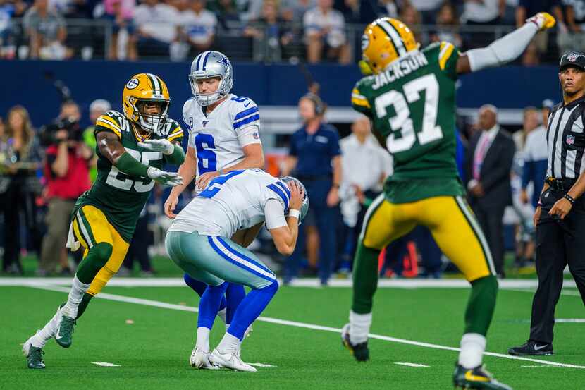 Green Bay Packers cornerbacks Will Redmond (25) and Josh Jackson (37) celebrate as Dallas...