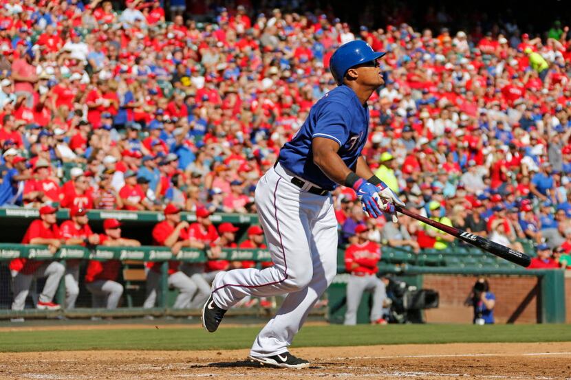 Texas Rangers third baseman Adrian Beltre (29) watches his two-run homer in the fifth that...