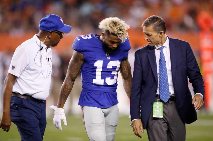 CLEVELAND, OH - AUGUST 21: Odell Beckham Jr. #13 of the New York Giants walks off the field...