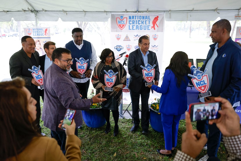 City officials including (from left) Arun Agarwal and Mayor Pro Tem Carolyn King Arnold...