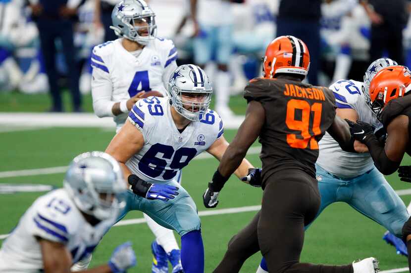 Dallas Cowboys offensive tackle Brandon Knight (69) blocks Cleveland Browns defensive end...