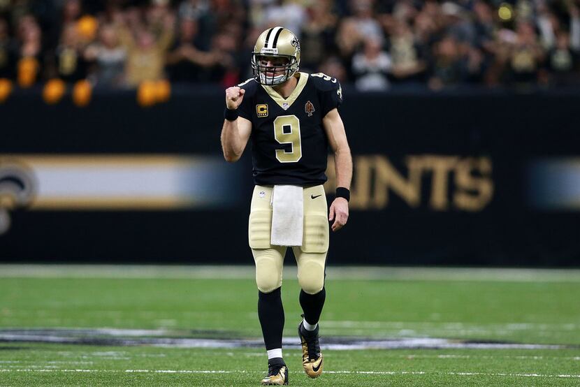 NEW ORLEANS, LA - DECEMBER 17: Quarterback Drew Brees #9 of the New Orleans Saints reacts...