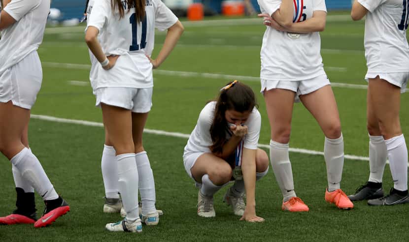 Wakeland's Rachel Perry (2) reacts after the UIL 5A girls State championship soccer game...