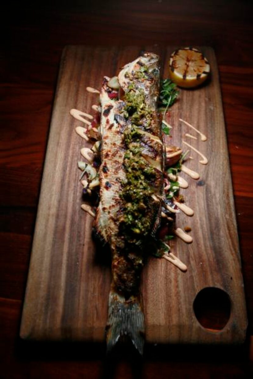 
Whole branzino with crushed lemony potatoes, crispy capers and pimenton aioli
