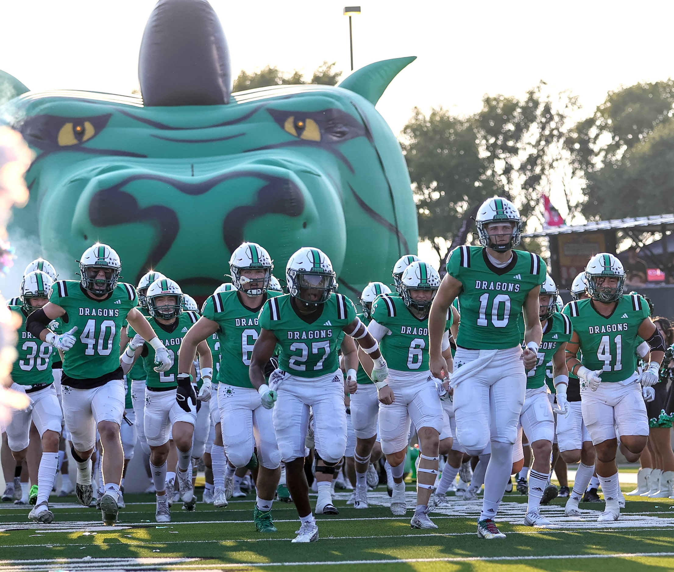 The Southlake Carroll Dragons enter the field to face Flower Mound Marcus in a high school...