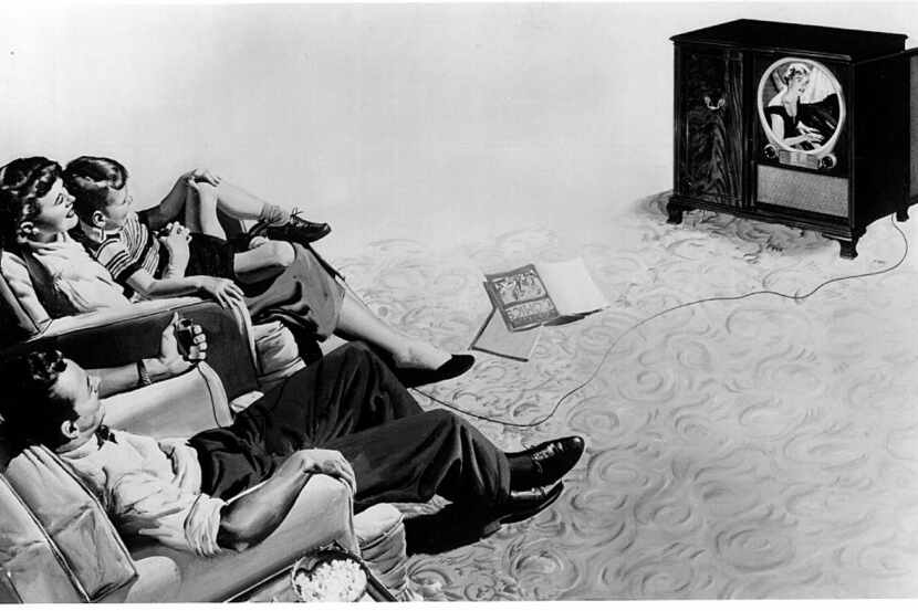 An undated handout illustration of a family using the first television remote control,...