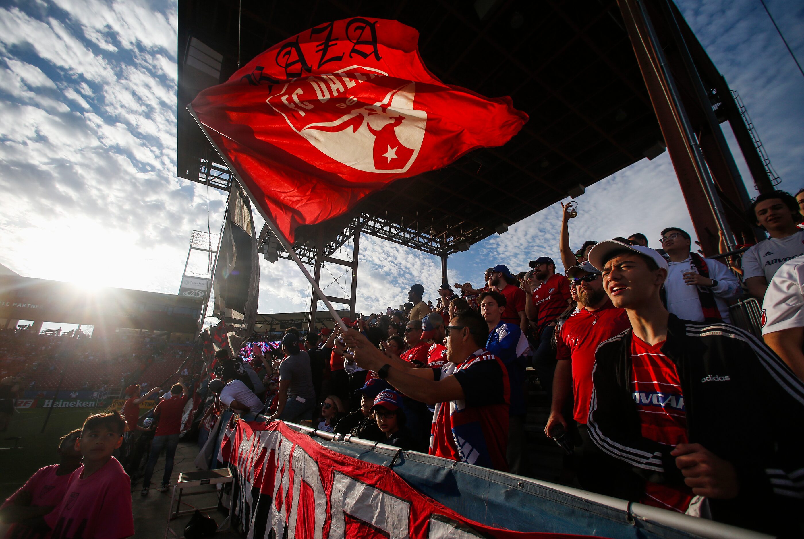 FC Dallas fans celebrate at the start of an MLS soccer match against Philadelphia Union on...