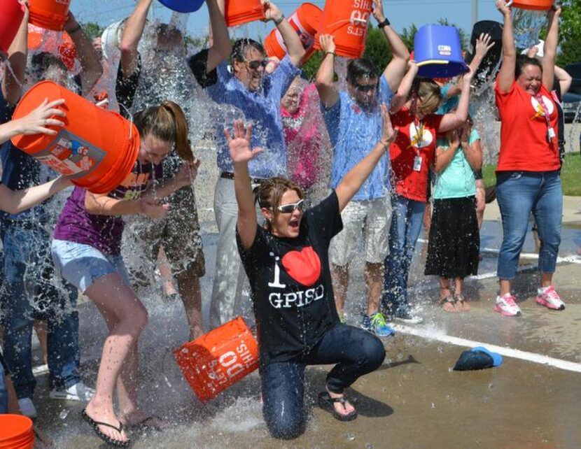 
Grand Prairie ISD Superintendent Susan Hull and a few hundred close friends, including...