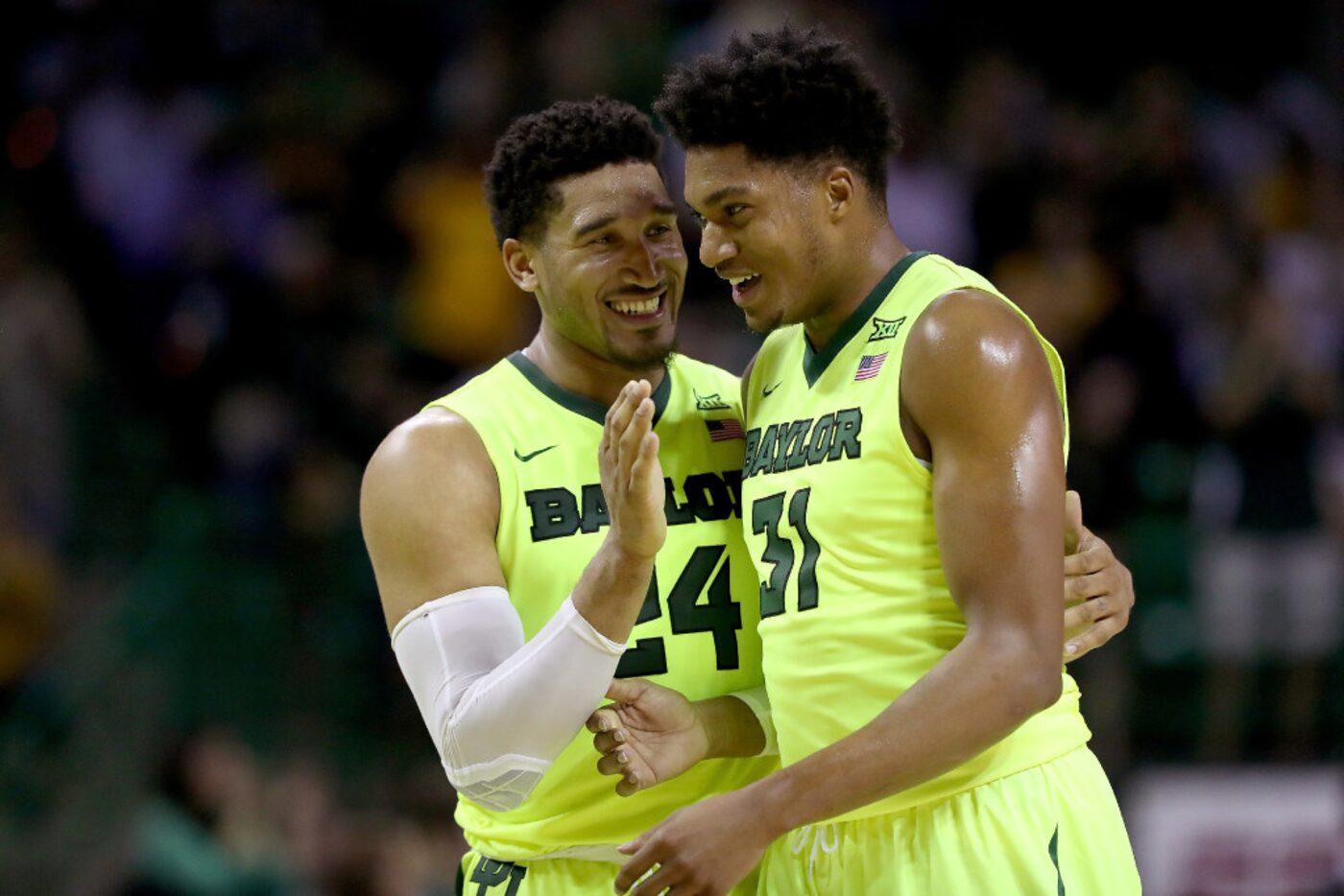 WACO, TX - FEBRUARY 11:  Ishmail Wainright #24 of the Baylor Bears celegrates with Terry...