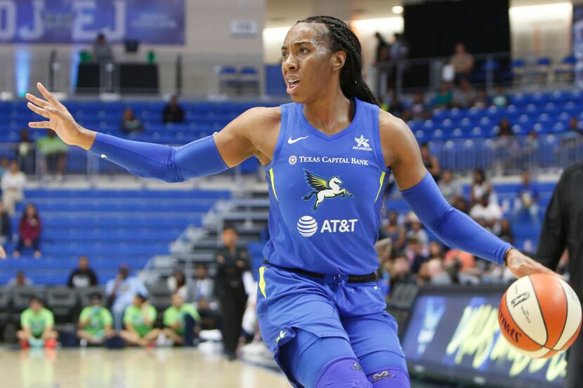 Dallas Wings forward Kayla Thornton (6) directs the offense as she sets up a play during...