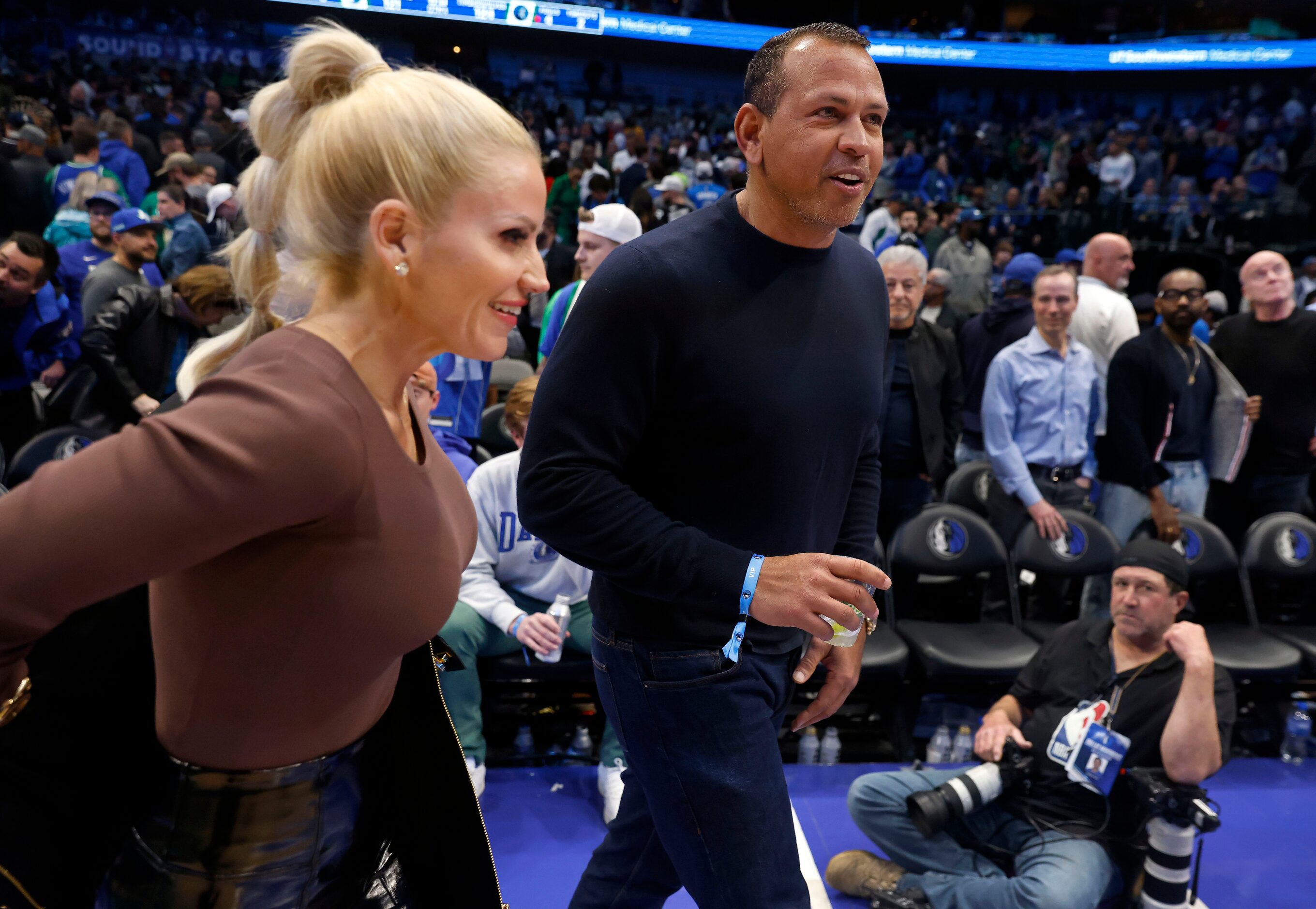 Minnesota Timberwolves minority owner Alex Rodriguez and his girlfriend Jac Cordeiro walk to...