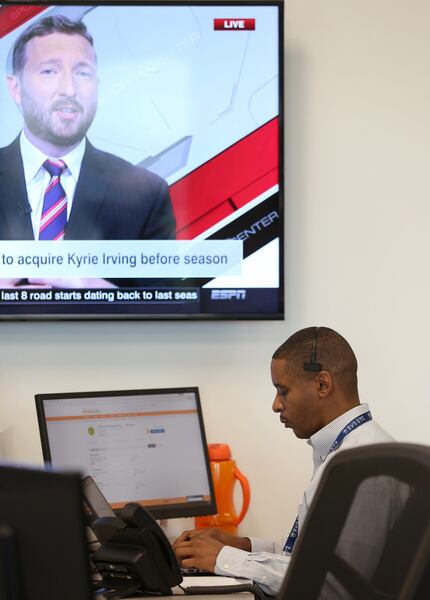 Darnell Cain, a digital sales manager at Blue Star Sports, works at the company's office at...