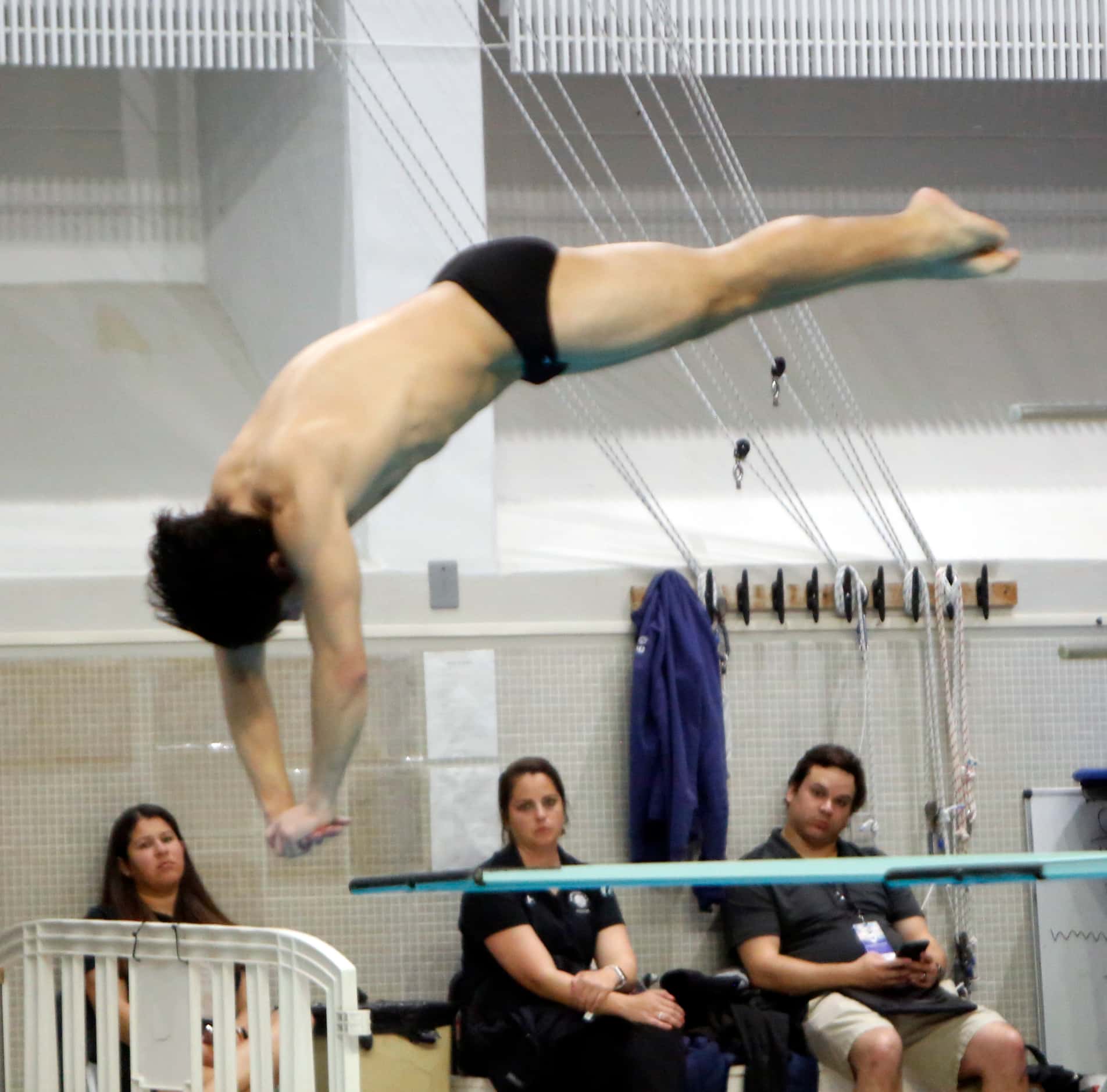 Flower Mound Marcus diver Paul Hong competes in the 6A Boys Diving competition. The first...