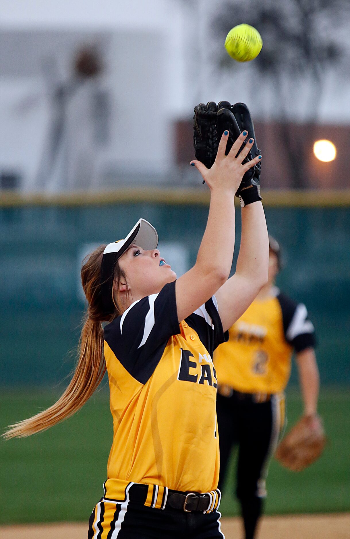 The Plano East High School shortstop Mackenzie Stark (7 ) catches an infield fly against...