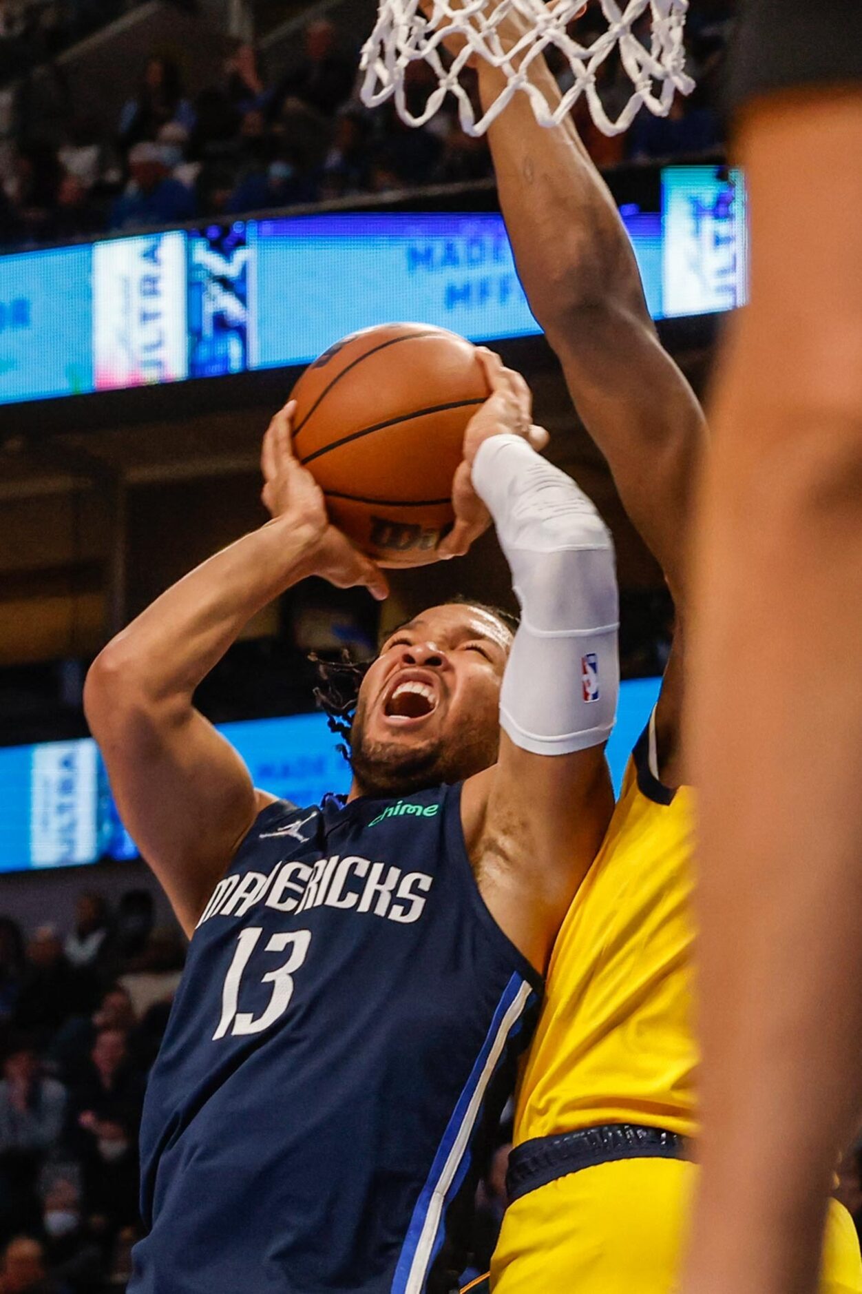 Dallas Mavericks guard Jalen Brunson (13) goes for a shot against the Indiana Pacers during...