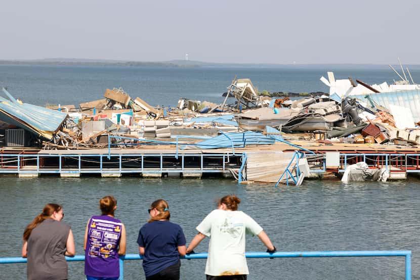 Scattered and damaged marine vehicles and boats at Ray Roberts Marina, on Sunday, May 26,...