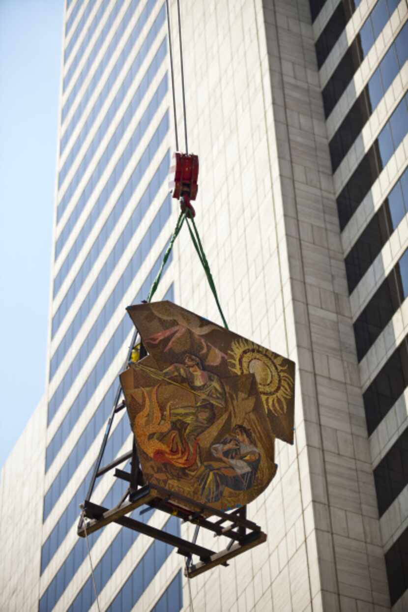 Six years after being rescued from the Mercantile Bank complex, a mosaic is moved into the...