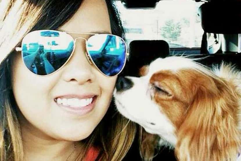 
Nurse Nina Pham cuddled with her Cavalier King Charles spaniel, Bentley, in a picture...