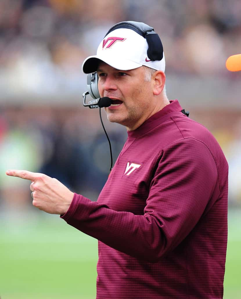 ATLANTA, GA - NOVEMBER 11: Head Coach Justin Fuente of the Virginia Tech Hokies calls a play...