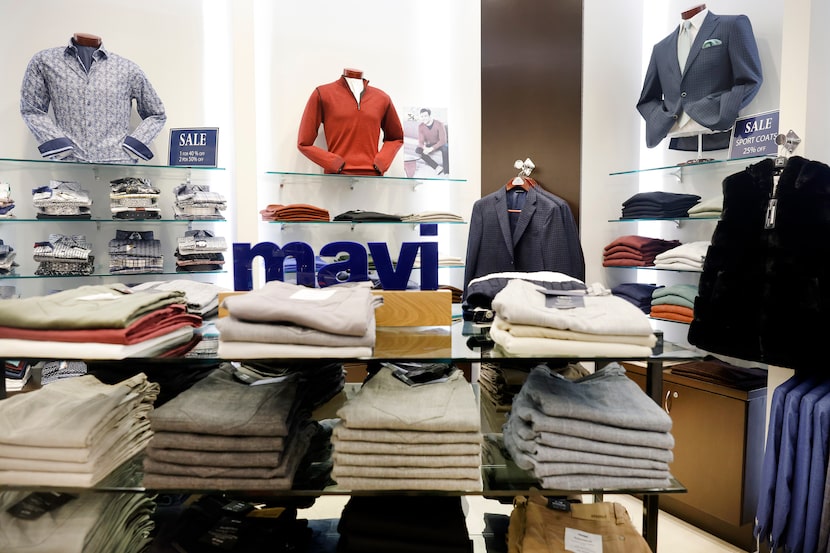 An interior view of Ertekin men's and women's apparel store in Terminal A at DFW Airport. 