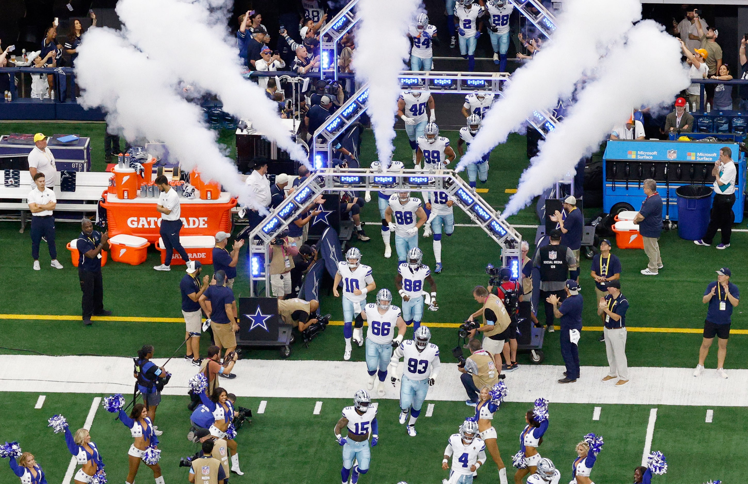 Dallas Cowboys players take the field before an NFL football game against the New Orleans...