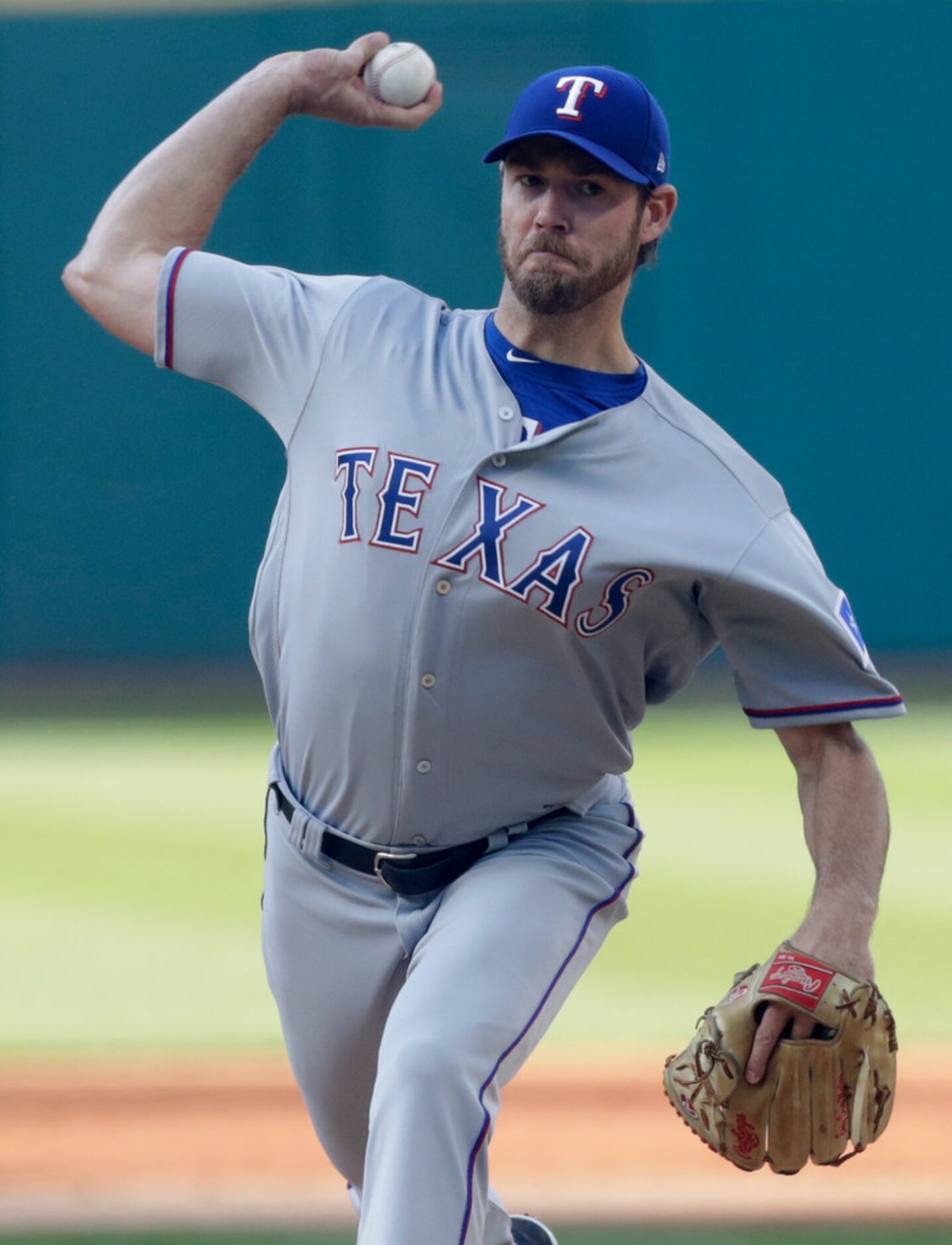 Texas Rangers starting pitcher Doug Fister delivers in the first inning of the team's...