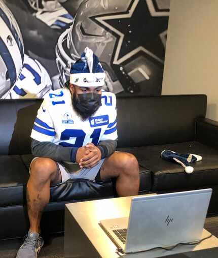 Cowboys running back Ezekiel Elliott talking with patients at one of four local children’s...