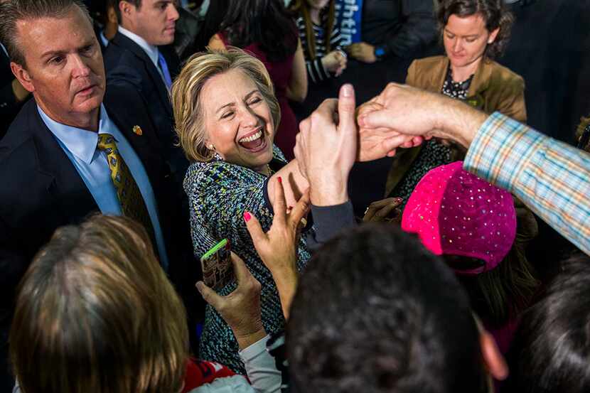  Presidential Candidate Hillary Rodham Clinton shakes the hand of a supporter after she...
