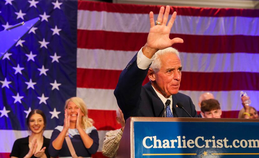 U.S. Rep. Charlie Crist addresses supporters after he is announced the winner of his primary...