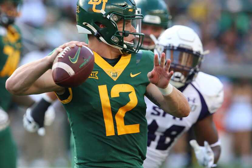 Baylor quarterback Charlie Brewer throws downfield against Stephen F. Austin in the first...