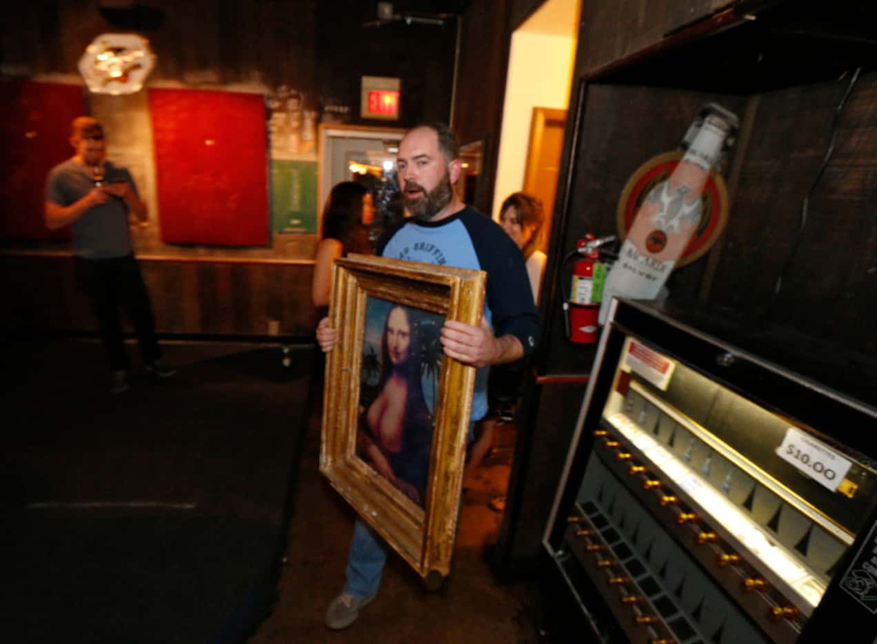 Fellow bar owner Mark Melton walked out with a topless Mona Lisa poster after purchasing it...