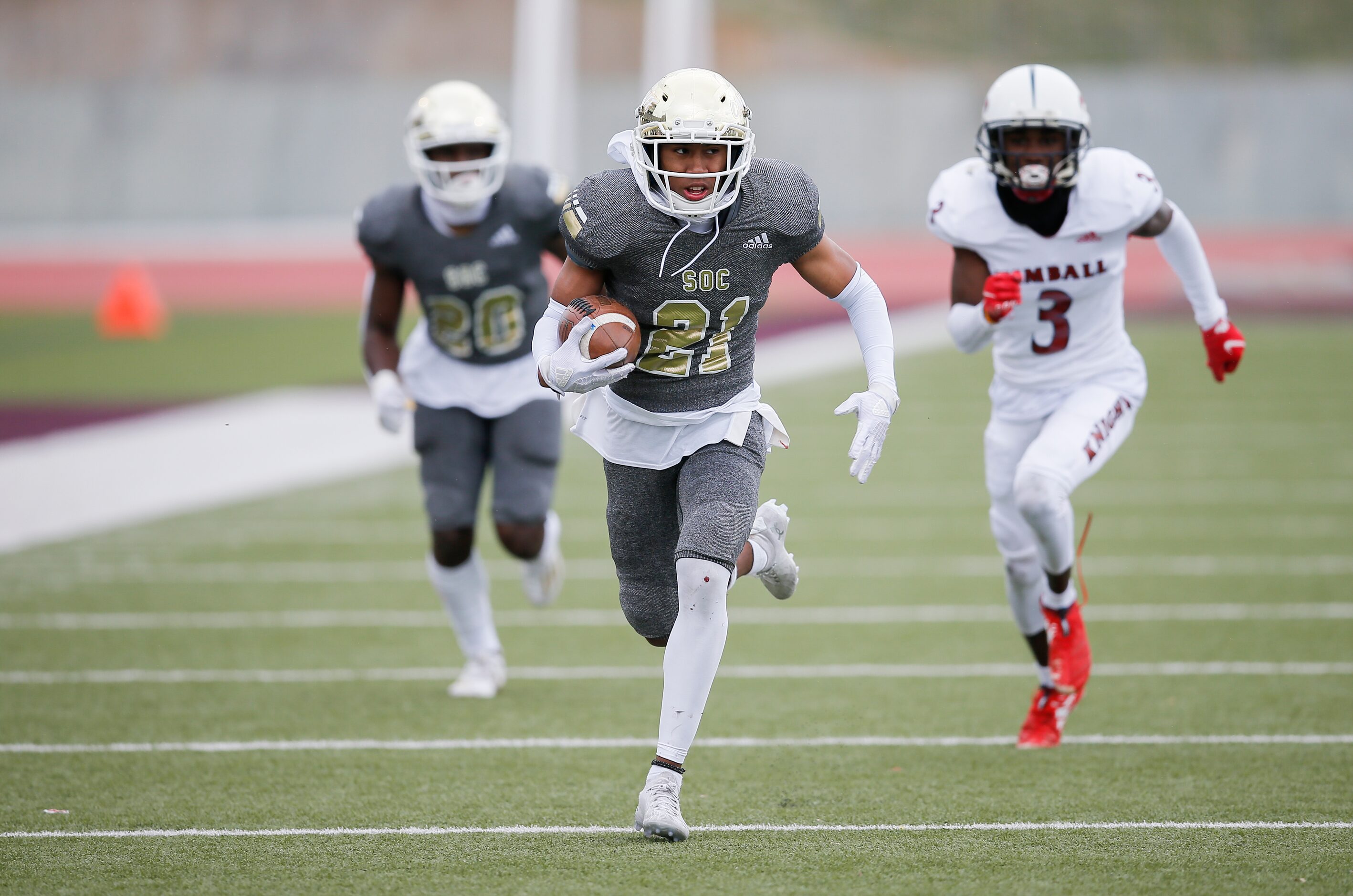 South Oak Cliff senior defensive back Jimmy Wyrick (21) runs back a punt for a touchdown...