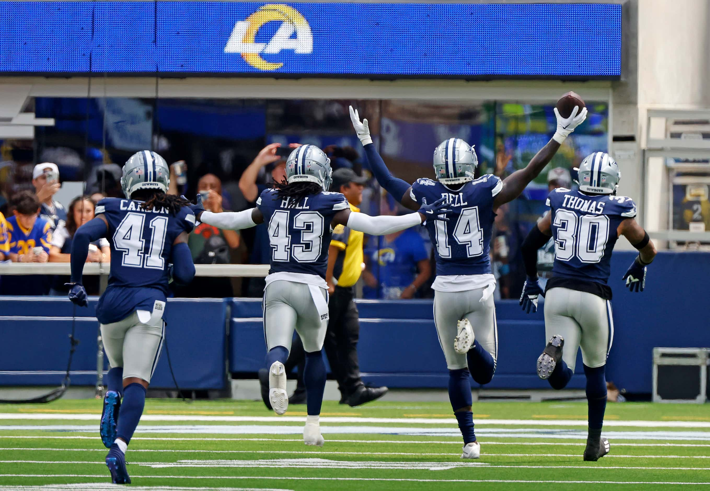 Dallas Cowboys safety Markquese Bell (14) celebrates his first half interception of Los...