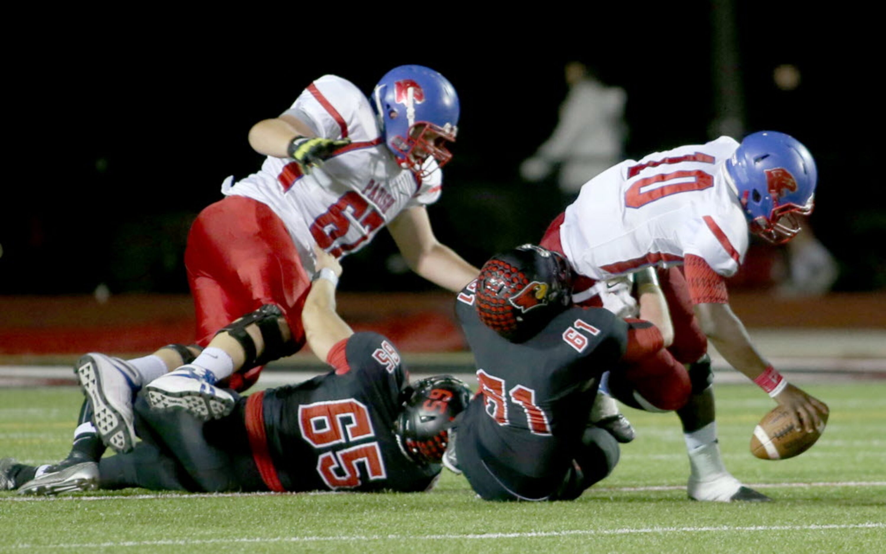 Parish Episcopal’s Jeremy Hodge (10) is sacked by Fort Worth Christian’s Thomas Mitchell...