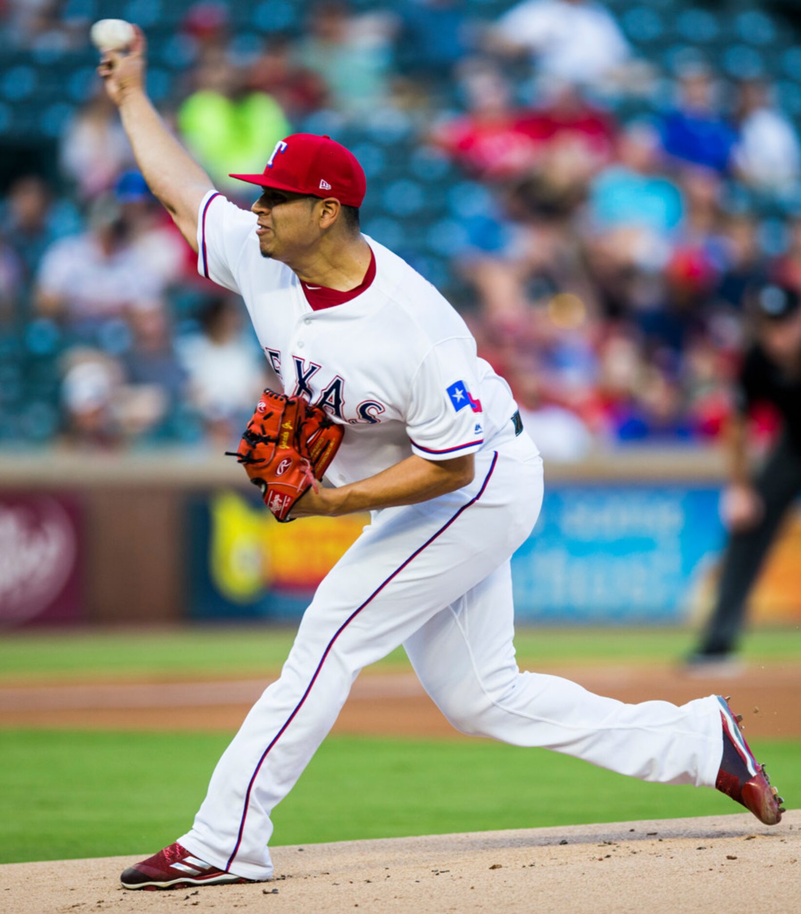 Texas Rangers starting pitcher Ariel Jurado (57) pitches during the first inning of an MLB...