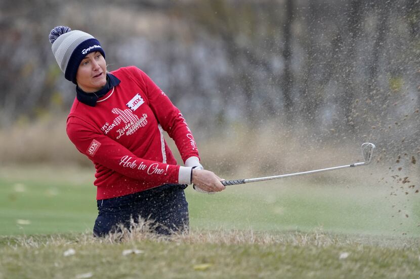 THE COLONY, TX - DECEMBER 03: Charley Hull of England hits from a sand trap on the 13th hole...