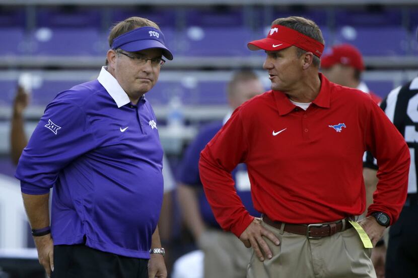 Head coach Gary Patterson of the TCU Horned Frogs and head coach Chad Morris of the Southern...