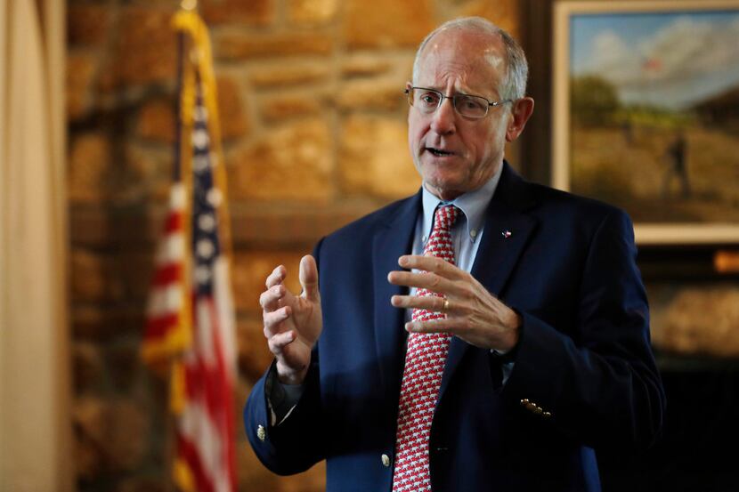 U.S. Rep. Mike Conaway, R-Midland, holds a town hall meeting with constituents on April 18....