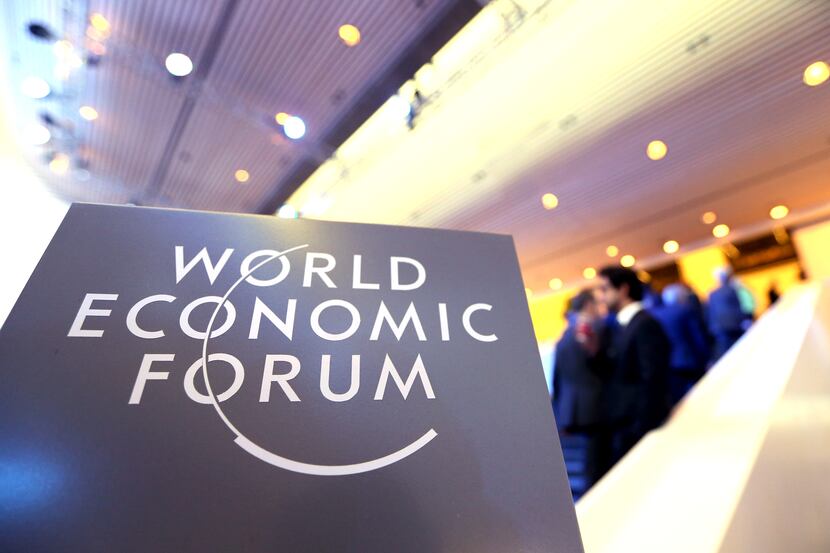 A logo sits on a sign inside the Congress Center on day two of the World Economic Forum...
