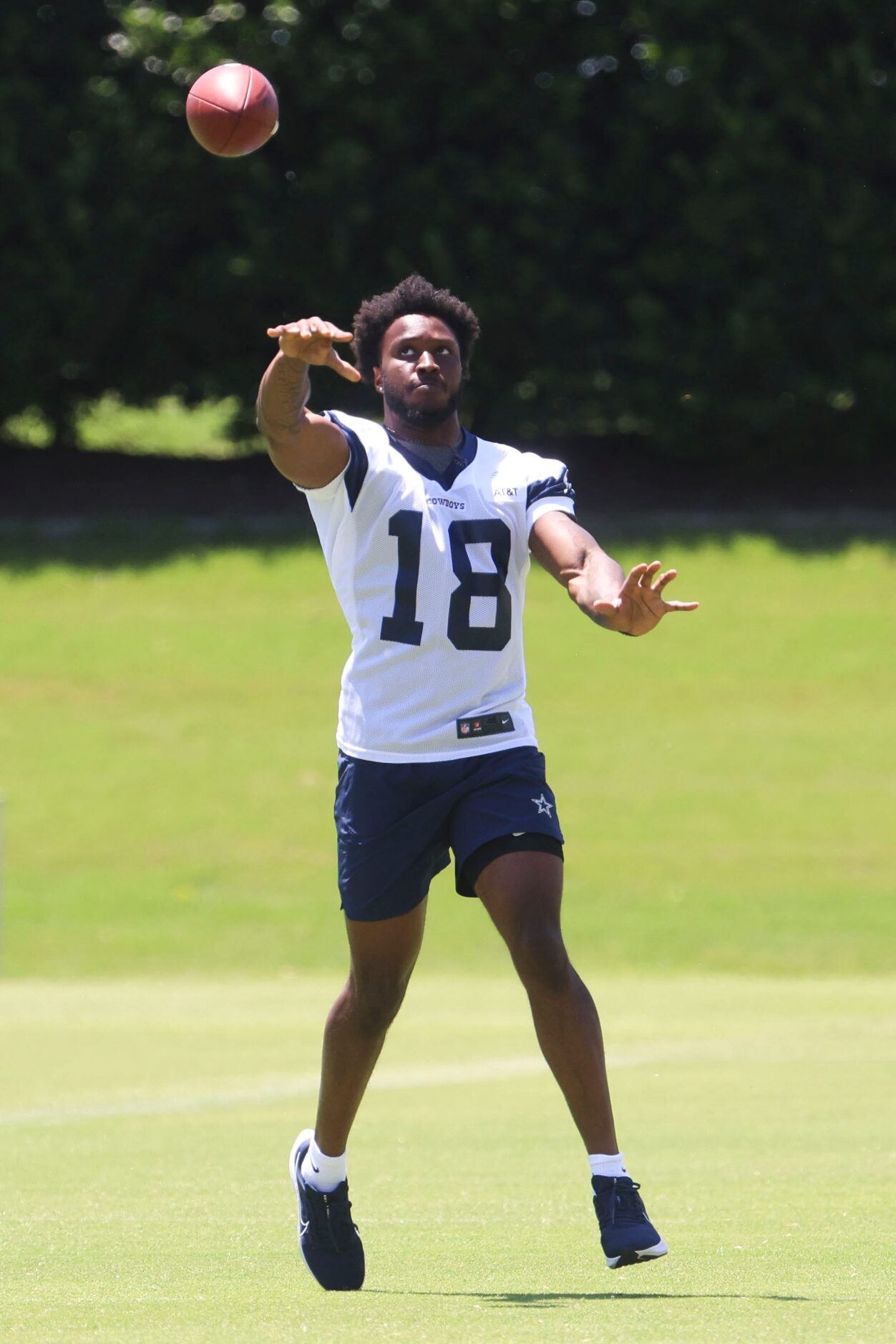 Dallas Cowboys wide receiver Ryan Flournoy throws the ball during a rookie minicamp, on...