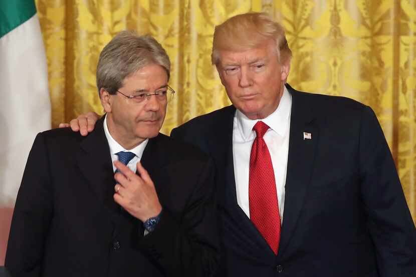 U.S. President Donald Trump and Prime Minister Paolo Gentiloni of Italy pose for a photo...