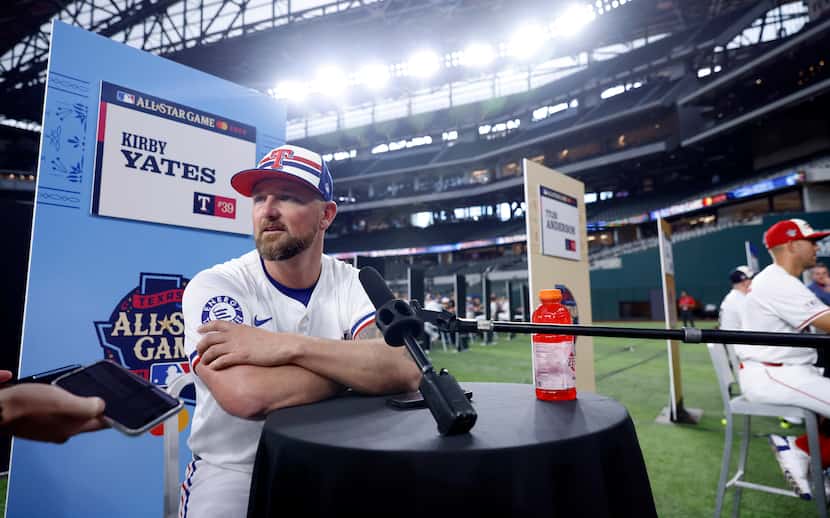 Texas Rangers relief pitcher Kirby Yates answers questions from the media during All-Star...