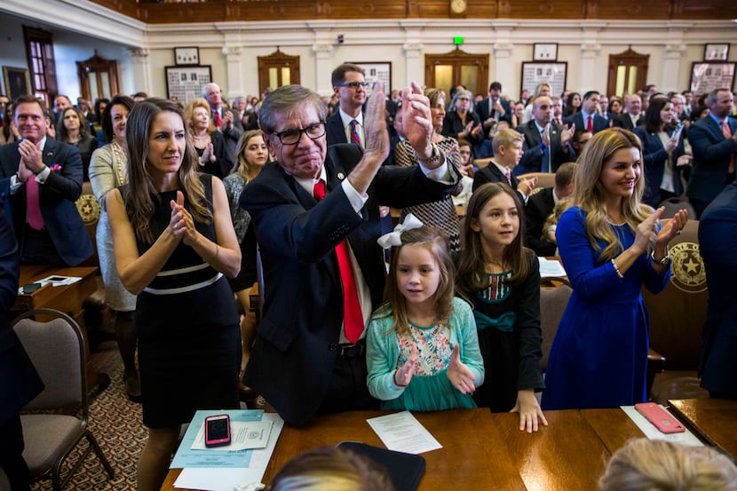 Texas State Rep. Phil Stephenson and his family applaud the election of Rep. Joe Strauss as...