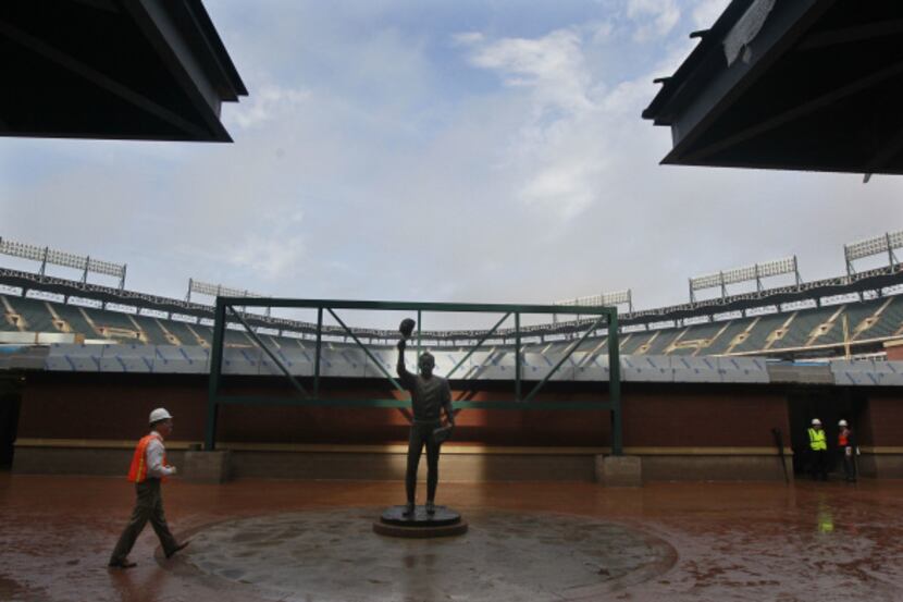 The statue of Nolan Ryan has been repositioned in front of the Batter's Eye Club, which is...