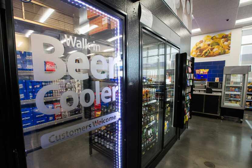 A walk-in beer cooler inside a new Walmart convenience store on Feb. 8, 2017 in Crowley....