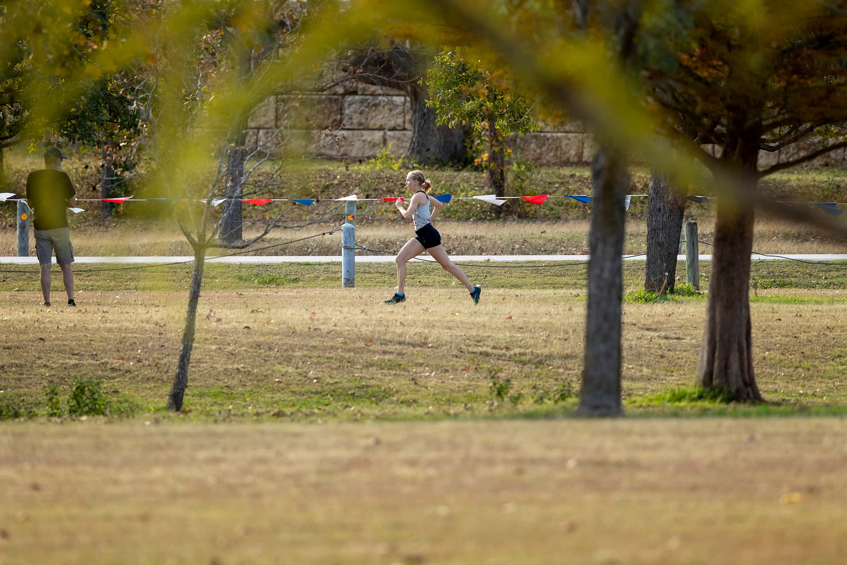 Denton Guyer's Brynn Brown (2240) gets a large lead to finish first in the girls UIL Class...