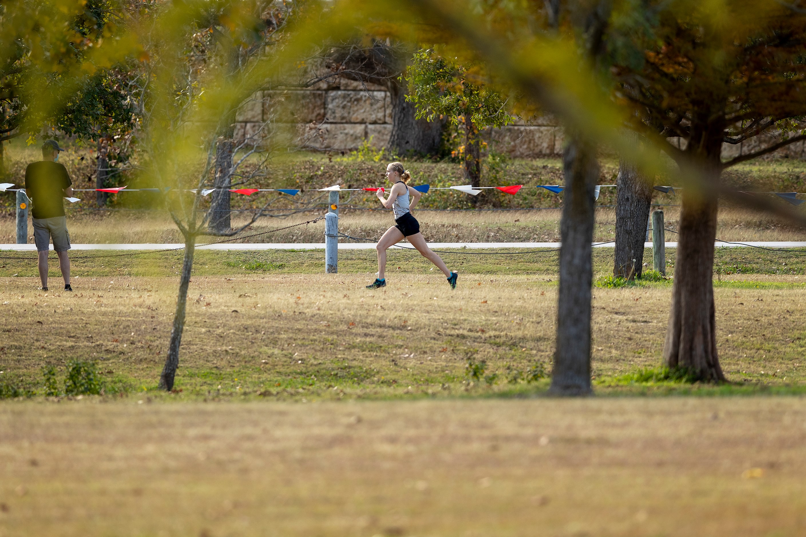 Denton Guyer's Brynn Brown (2240) gets a large lead to finish first in the girls UIL Class...