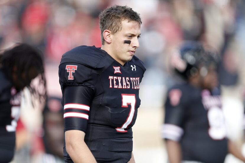 Texas Tech's Davis Webb is pictured walking off the field after a game against Arkansas in...