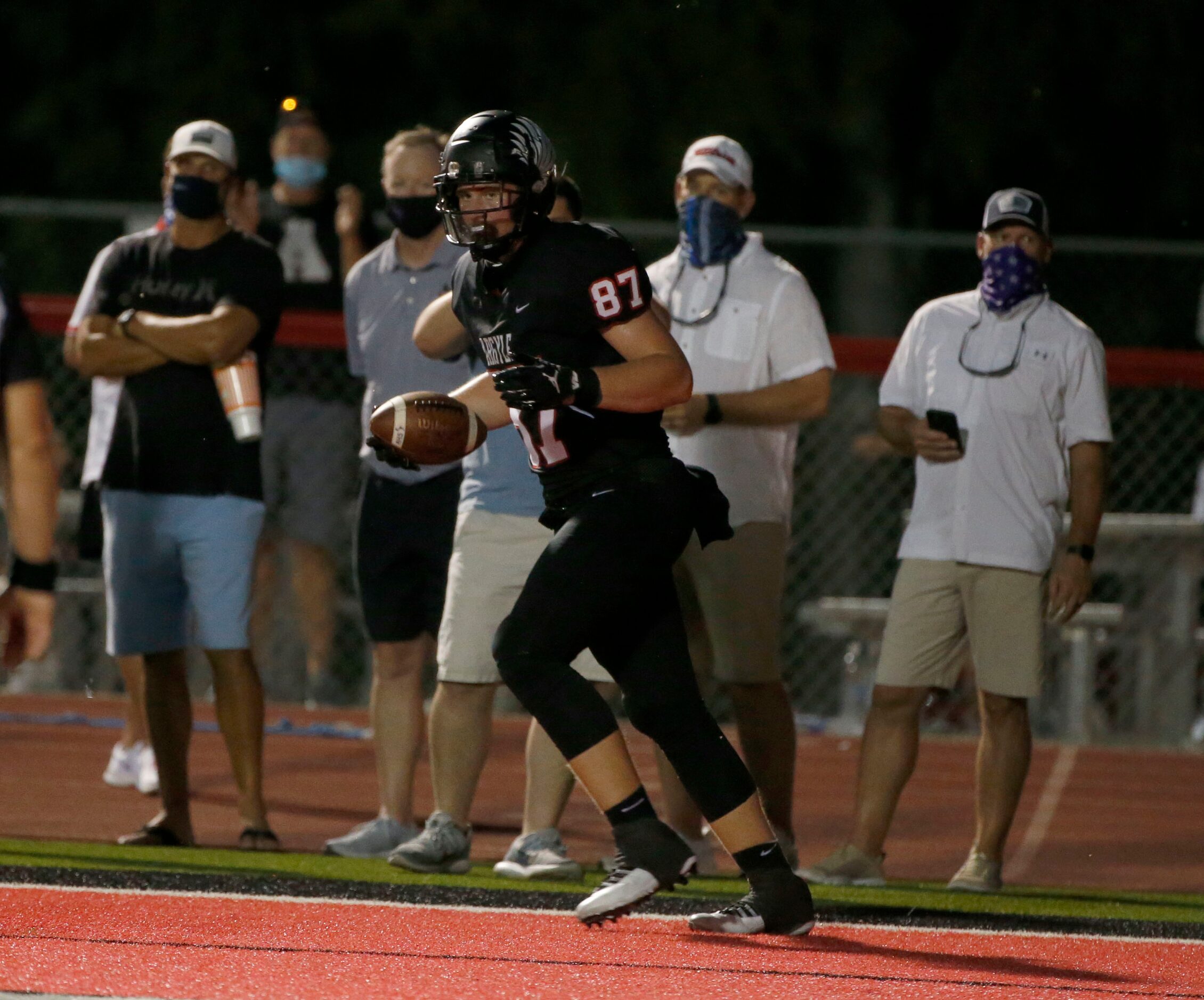 Argyles Jasper Lott (87) scores a touchdown against Decatur during a high school football...